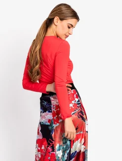 CUERPO ESCOTE ASIMETRICO ROJO/CORAL