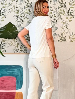 Jeans más bolsillos crema