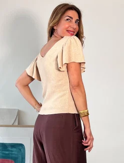 Pull escote en pico oro última M